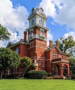 Wedding Ministers & Officiants of Atlanta prepare to perform a beautiful Bride and Groom Elopement Ceremony and sign the County Marriage License at Gwinnett Historic Courthouse