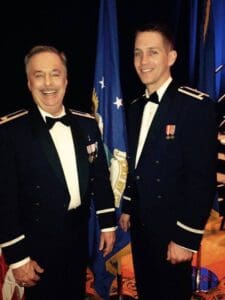Military Wedding Chaplain formal military attire smiling.